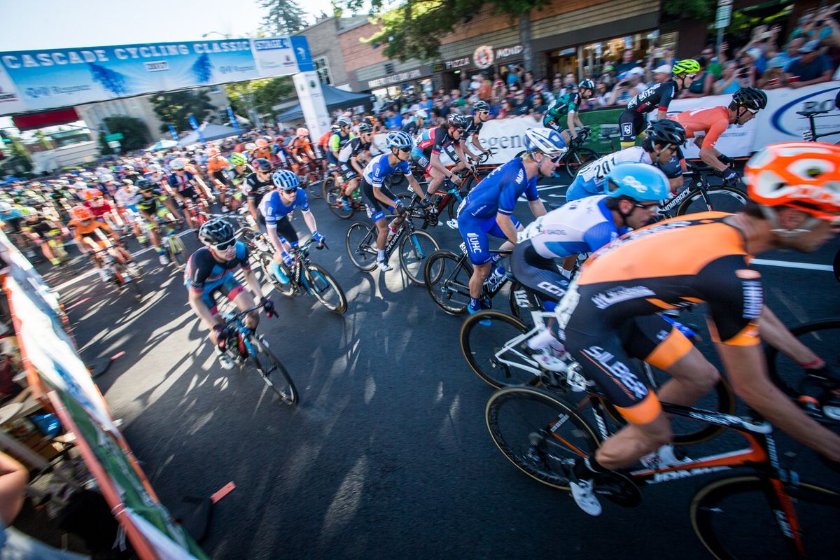 The men leave the start line for stage 4 of the Cascade Cycling Classic.