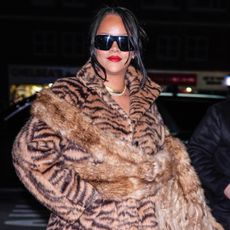 Rihanna approved the tiger print trend in a fur coat and matching ankle-strap pumps