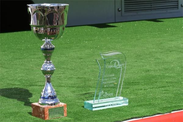 Two trophies await presentation