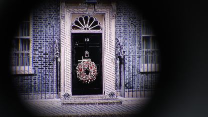 A Christmas wreath on the door of number 10 Downing Street 