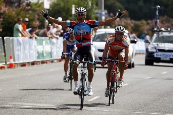 Lang shows his excitement at his win as he crosses the finish line