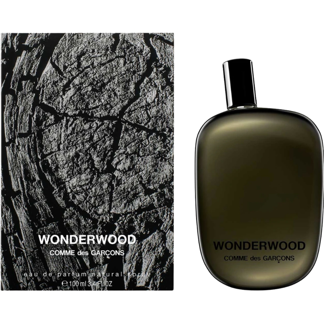 A product shot of the Comme des Gar&amp;ccedil;ons Wonderwood Eau de parfum alongside its grey, wood-textured box