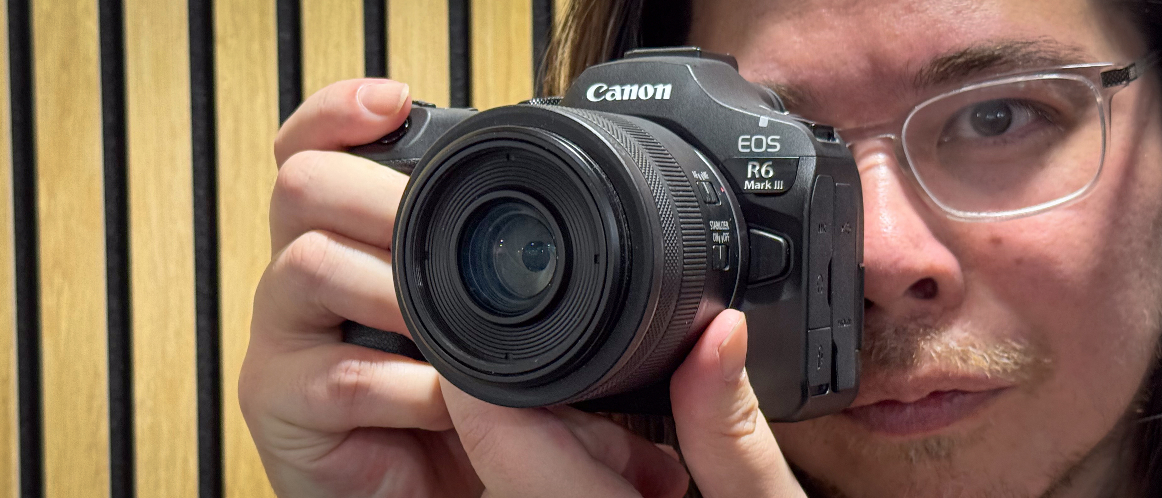 Canon EOS R6 Mark III being held by photographer James Artaius