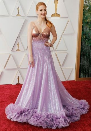 Jessica Chastaim wearing rose gold and lavender sequin Gucci dress at the 2022 Oscars