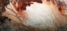 The bright white region of this image, captured by Europe's Mars Express spacecraft in December 2012, shows the icy cap that covers Mars&rsquo; south pole, composed of frozen water and frozen carbon dioxide.