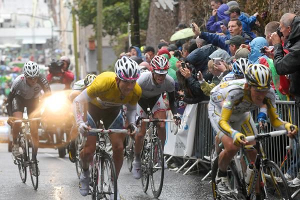 The leading group grapple with the brutally steep incline of St. Patrick&rsquo;s Hill in Cork City. As if the circuit wasn&rsquo;t challenging enough, the riders had to deal with what can only be described as a typhoon. Of the 103 starters, only 47 riders completed the stage.