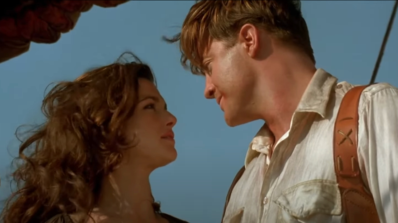 Rachel Weisz and Brendan Fraser share a romantic moment in the air in The Mummy Returns.