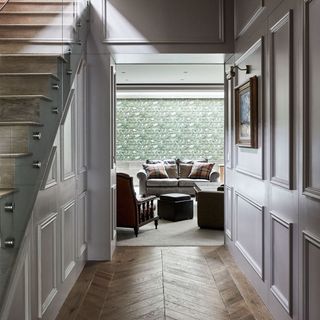 hallway with wooden flooring and staircase