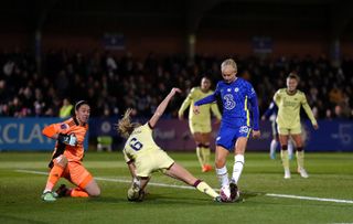 Chelsea’s Pernille Harder is denied by Leah Williamson