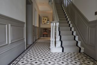 a hallway flooring idea using victorian floor tiles