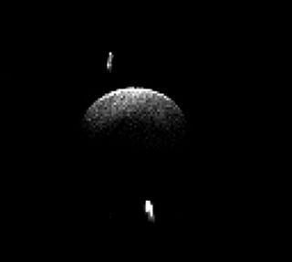 A radar image of the triple asteroid system 2001 SN263.