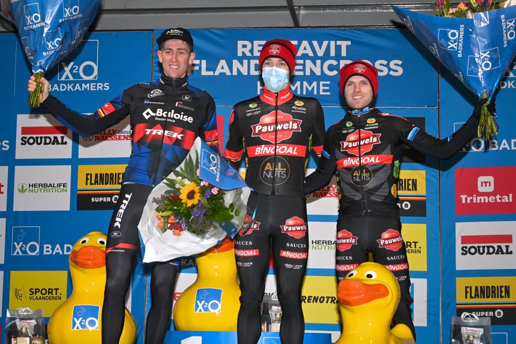 Belgian Toon Aerts Belgian Laurens Sweeck and Belgian Eli Iserbyt celebrates on the podium after the mens elite race of the Flandriencross cyclocross cycling event stage 68 in the Trofee Veldrijden competition Saturday 22 January 2022 in Hamme Belgium BELGA PHOTO DAVID STOCKMAN Photo by DAVID STOCKMANBELGA MAGAFP via Getty Images