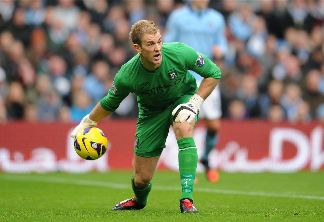 Joe Hart rolls the ball out while playing for Manchester City, September 2012