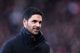 Arsenal manager Mikel Arteta smiles after winning in the Premier League at the Emirates Stadium