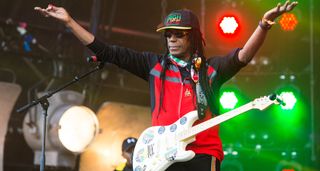 Junior Marvin plays a white Fender Stratocaster onstage at Rewind Festival, in Scotland