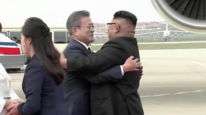 Kim Jong Un and Moon Jae-in embrace in Pyongyang