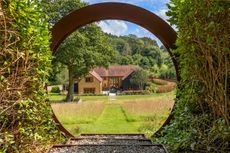 This six-bedroom home near Godalming is now on the market at £2,950,000 via Savills.