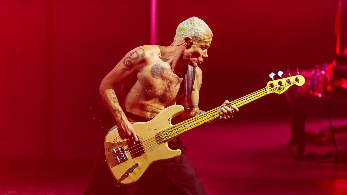 Flea from the Red Hot Chili Peppers performs on stage at Yaamava' Thea...