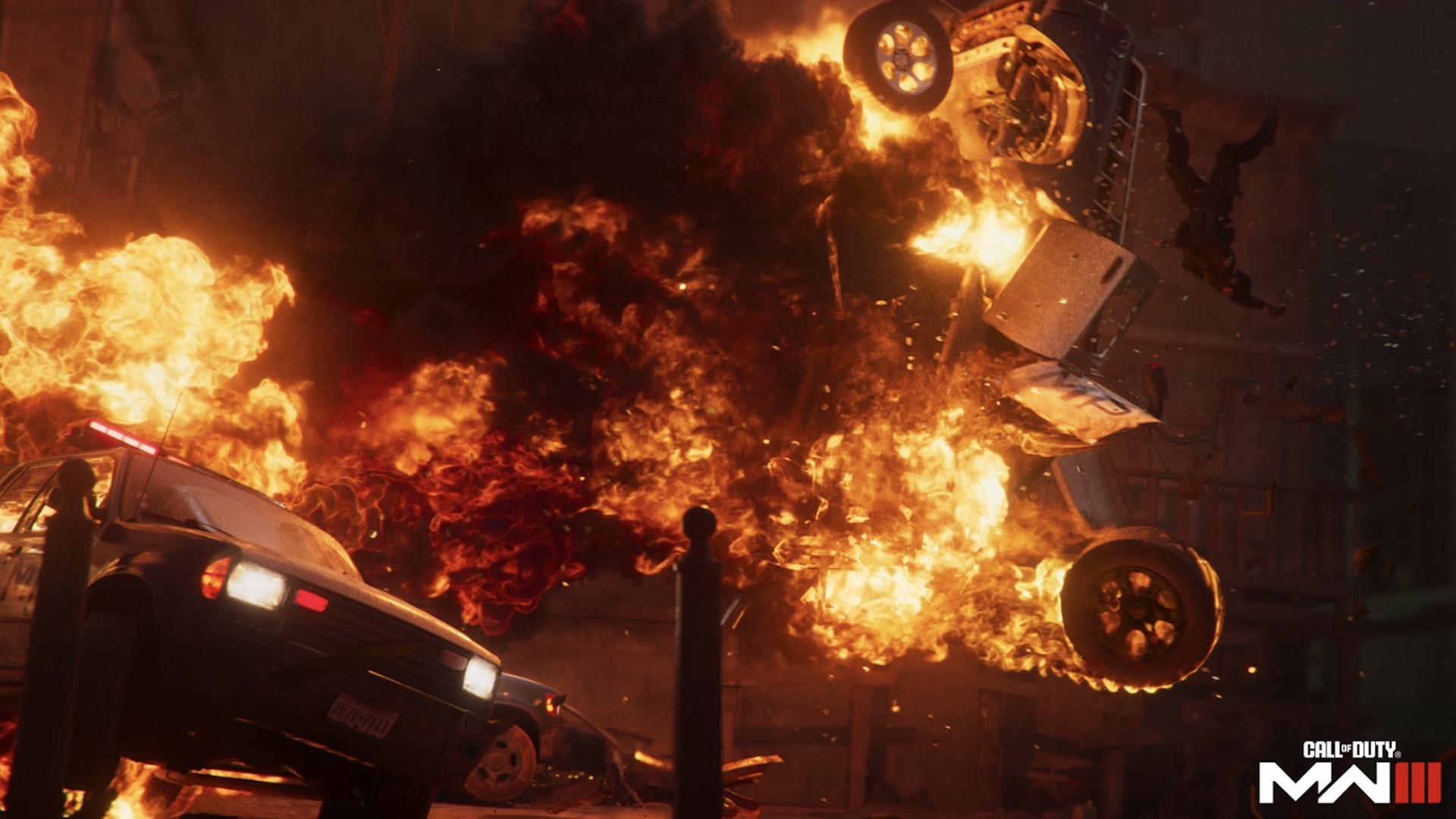 A car explodes, causing a fireball to rise into the air