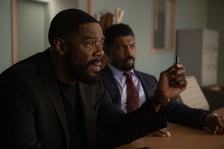 Colman Domingo as Muncie Daniels, holding a flash drive, and Deon Cole as Kwesi Dupree in Episode 108 of 'The Madness.'