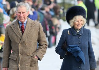 King Charles wears a tweed overcoat while attending church on Christmas Day with wife Queen Camilla, who wears a large black fur hat, and King Charles laughs at a cell phone with sons Prince William and Prince Harry