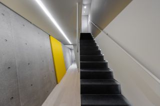 concrete corridor at terada house in Tokyo