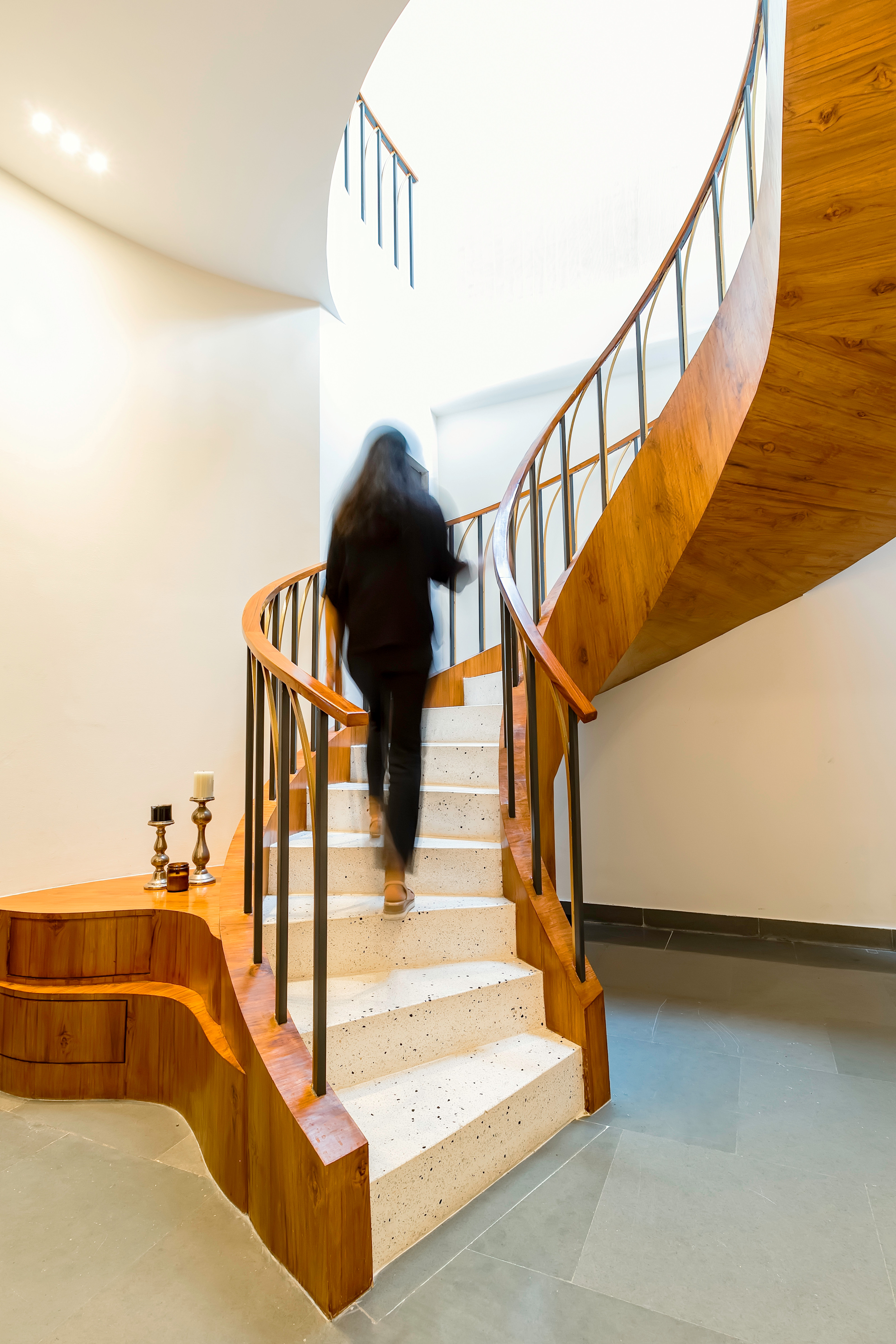The upper duplex has a toplit spiral staircase