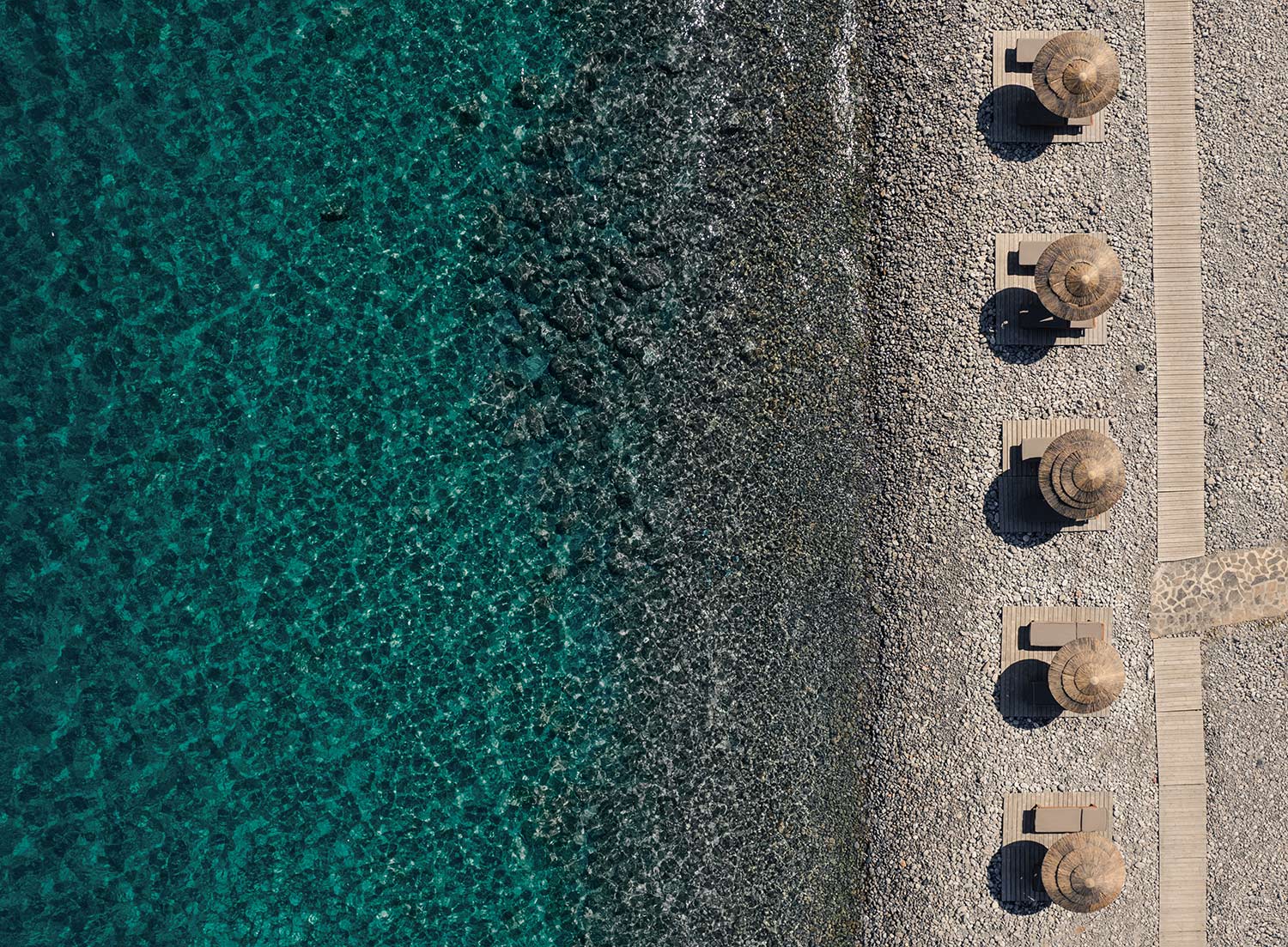 An aerial view of the beach Phaea Blue Palace in Crete