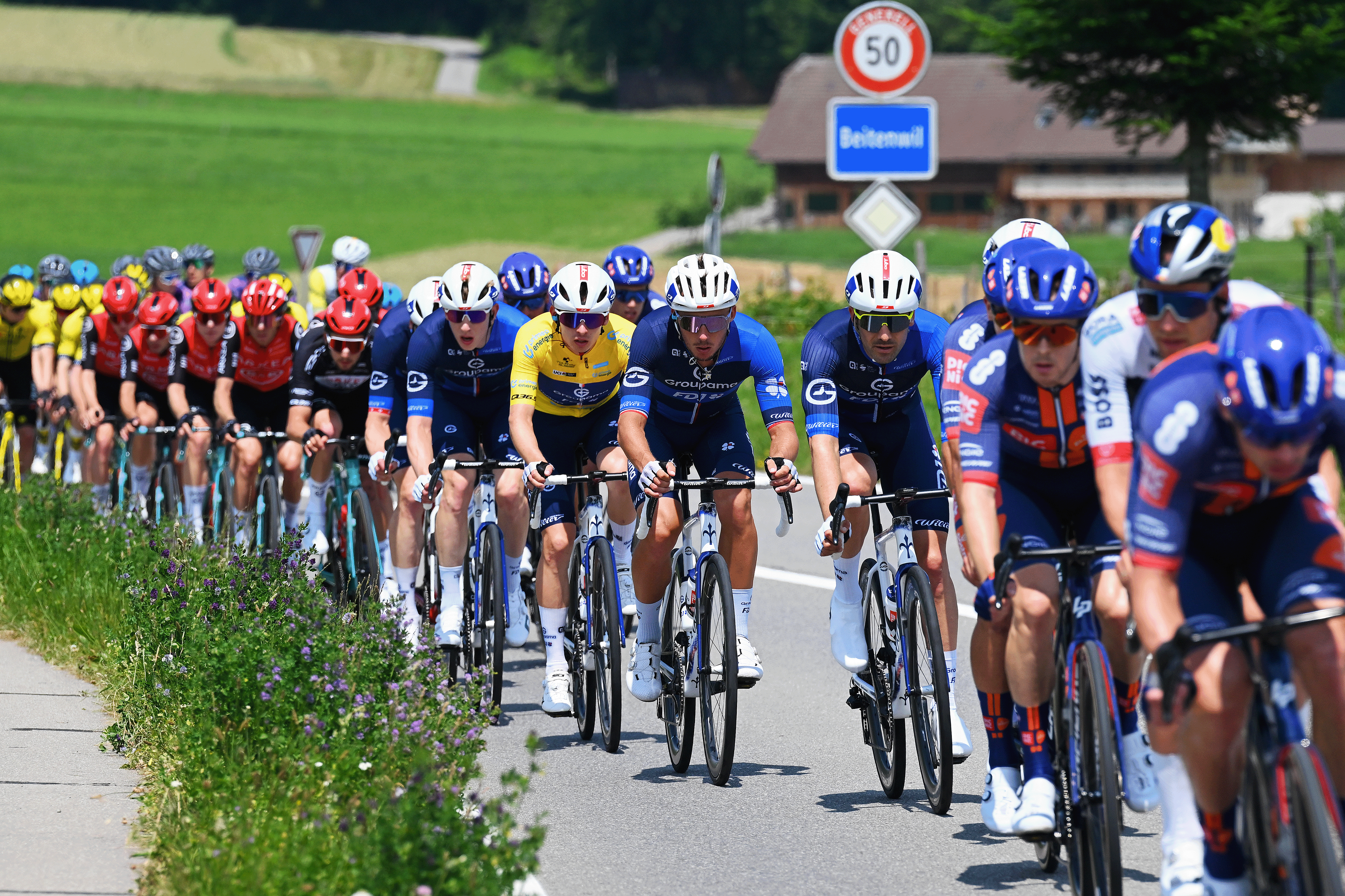 SCHWARZSEE, SWITZERLAND - JUNE 16: (L-R) Romain Gregoire of France - Yellow leader jersey and Valentin Madouas of France and Team Groupama - FDJ compete during the 88th Tour de Suisse, Stage 2 a 177km stage from Aarau to Schwarzsee / #UCIWT / on June 16, 2025 in Schwarzsee, Switzerland. (Photo by Tim de Waele/Getty Images)