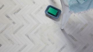 herringbone bathroom floor tiles