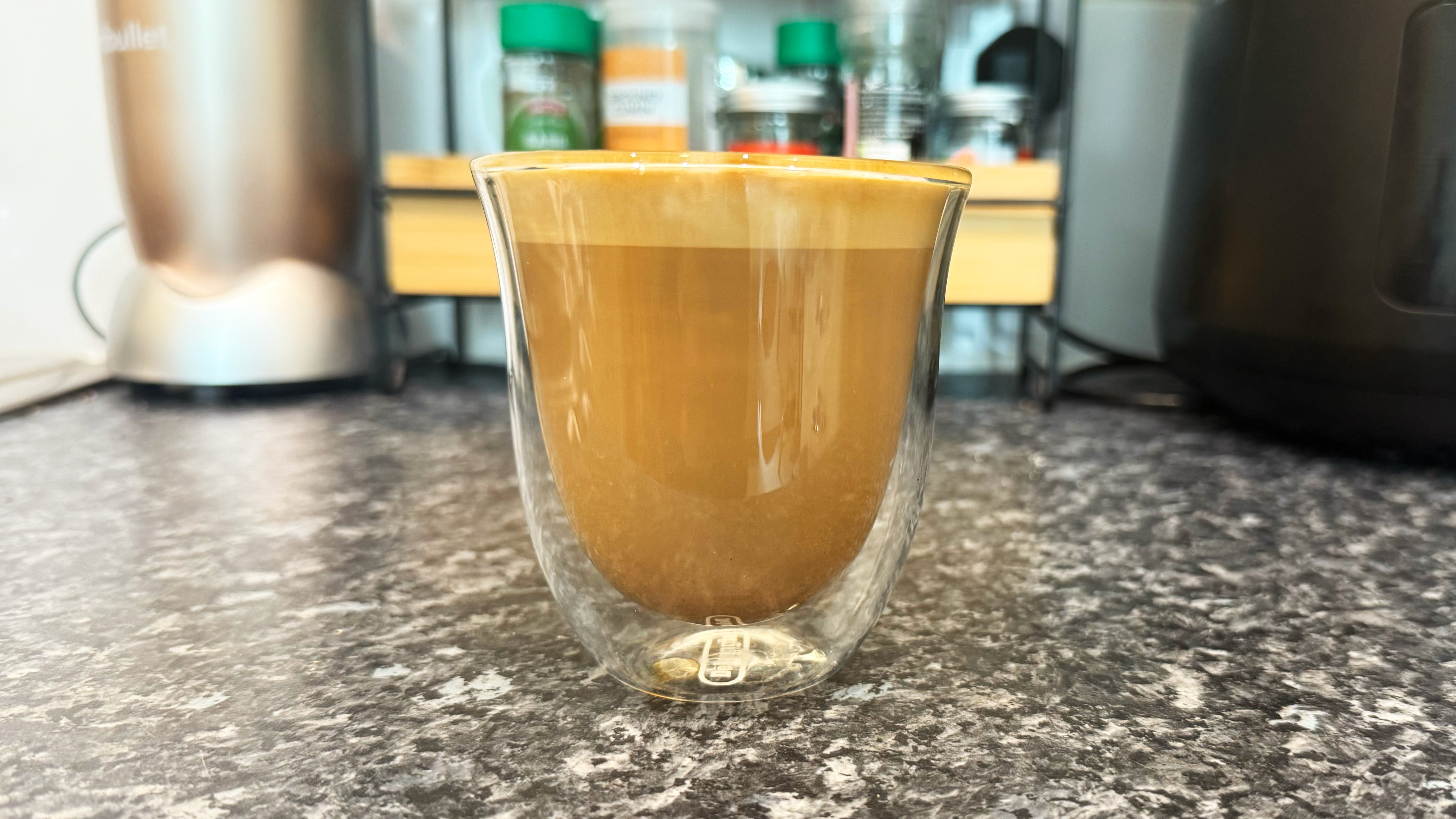 a picture of a latte made on the de'longhi la specialista opera following the author's recipe