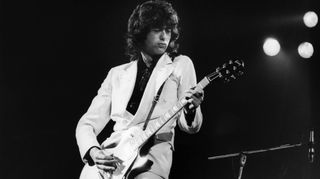 Jimmy Page performs with Led Zeppelin