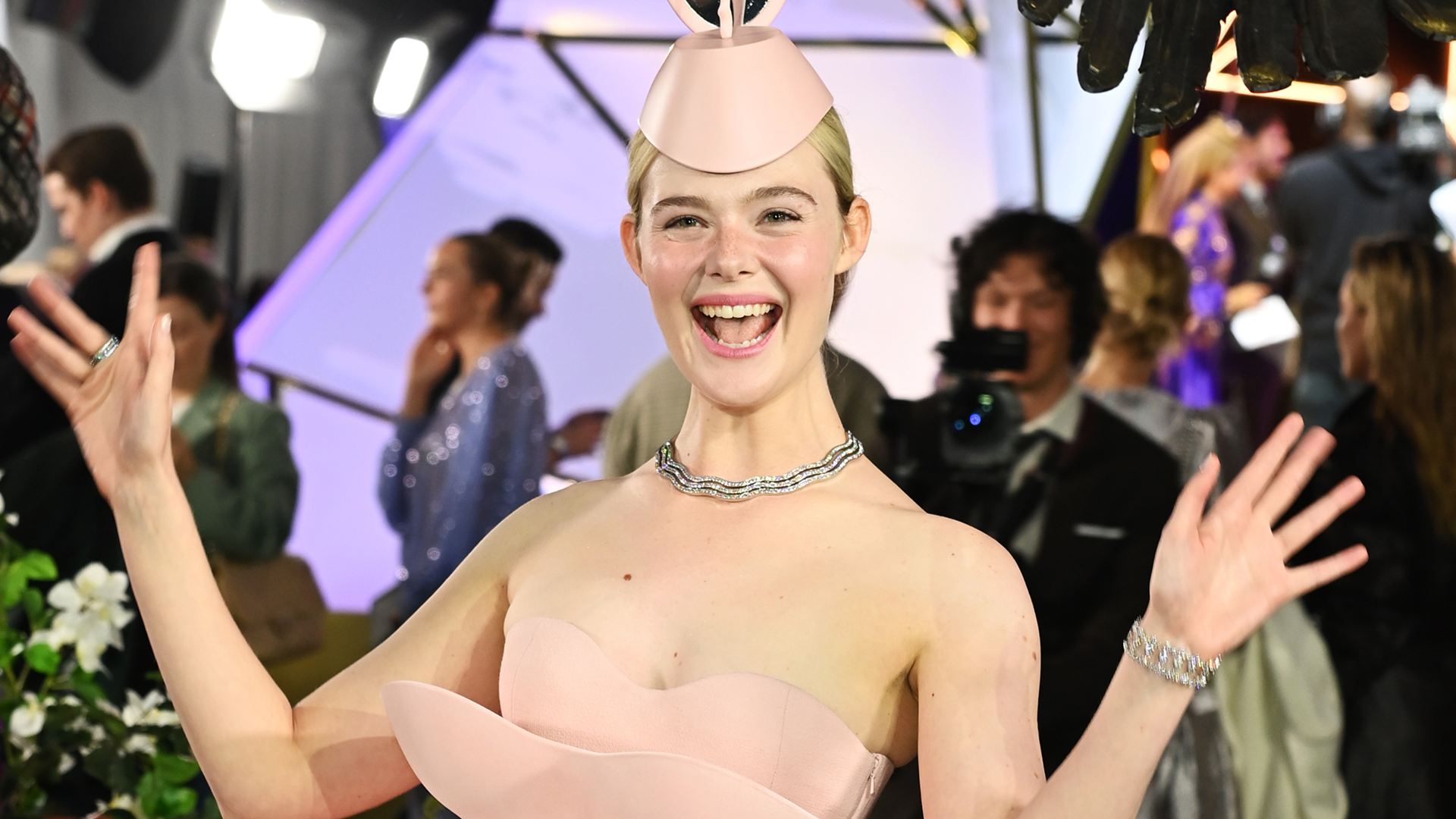 Elle Fanning wore a pink ballet-inspired tutu dress by Robert Wun at the 'Hunger Games: Sunrise on the Reaping' London premiere