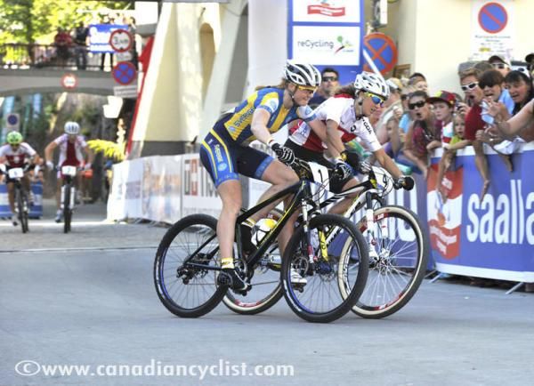 Alexandra Engen (Sweden) and Jolanda Neff (Switzerland) fight for the inside line at the start of the last lap