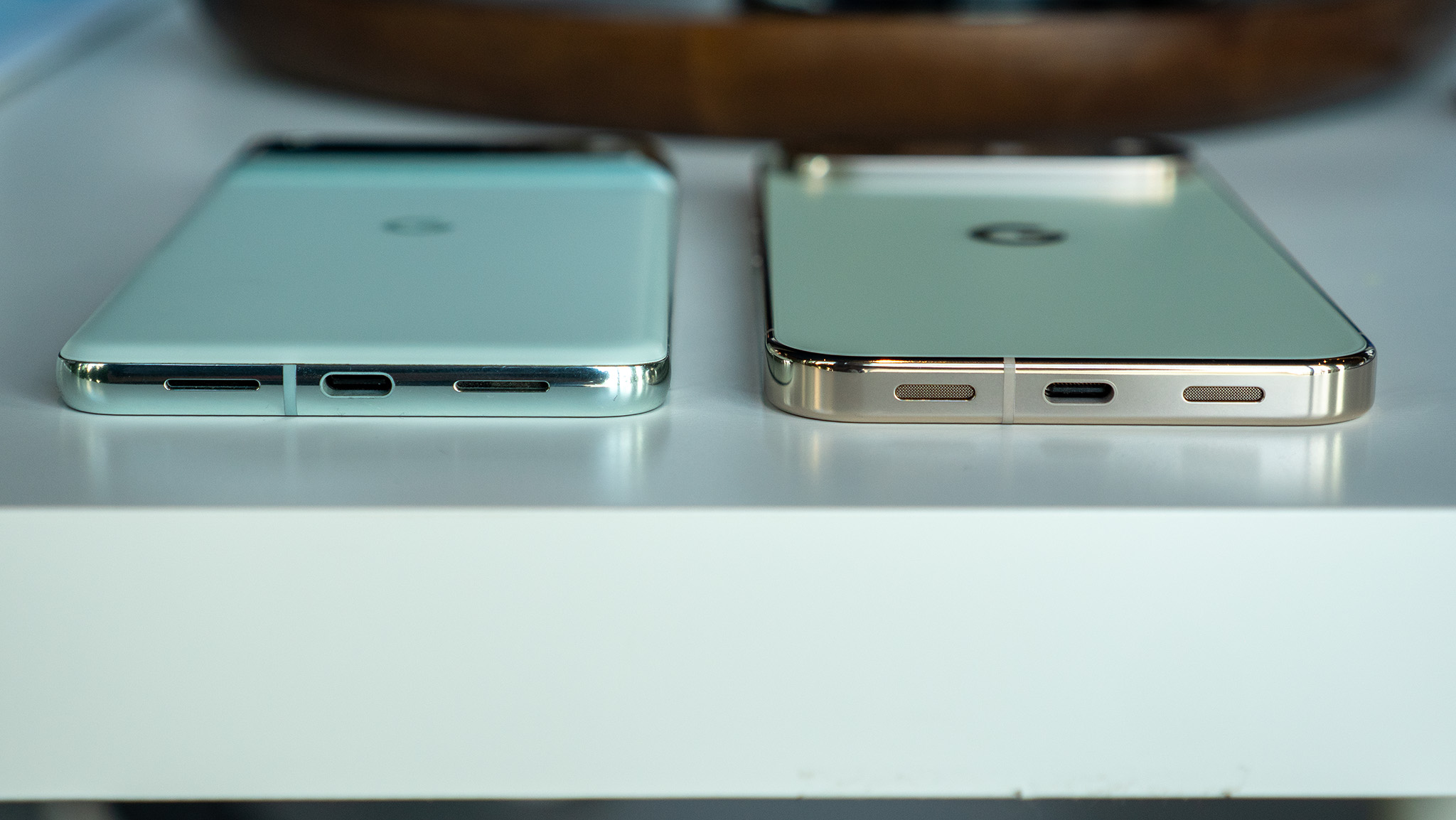 Comparing the mint Google Pixel 8 Pro's design to the jade Google Pixel 10 Pro XL's design