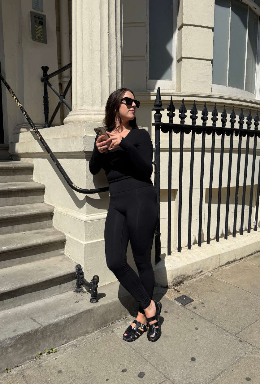 An image of Who What Wear's Ava Gilchrist reviewing Adanola ultimate leggings.