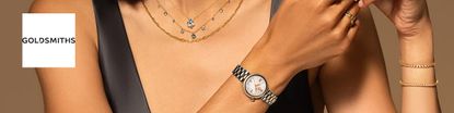 Woman modelling Goldsmith's jewellery and watches