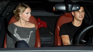 Taylor Swift and Taylor Lautner driving in a car in 2009