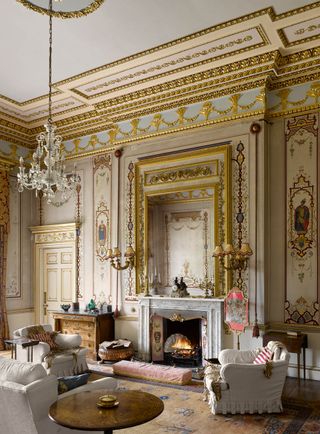 The Red Drawing Room. One specific inspiration for its painted decoration may have been the Bal Costumé of 1842; Queen Victoria’s costume as Queen Philippa of Hainault for the occasion closely resembles that of the figure of the Empress Matilda. Avington Park, Hampshire. ©Will Pryce / Country Life Picture Library