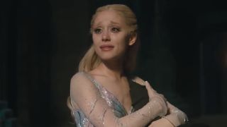 Glinda crying with Elphaba's hat in Wicked: For Good