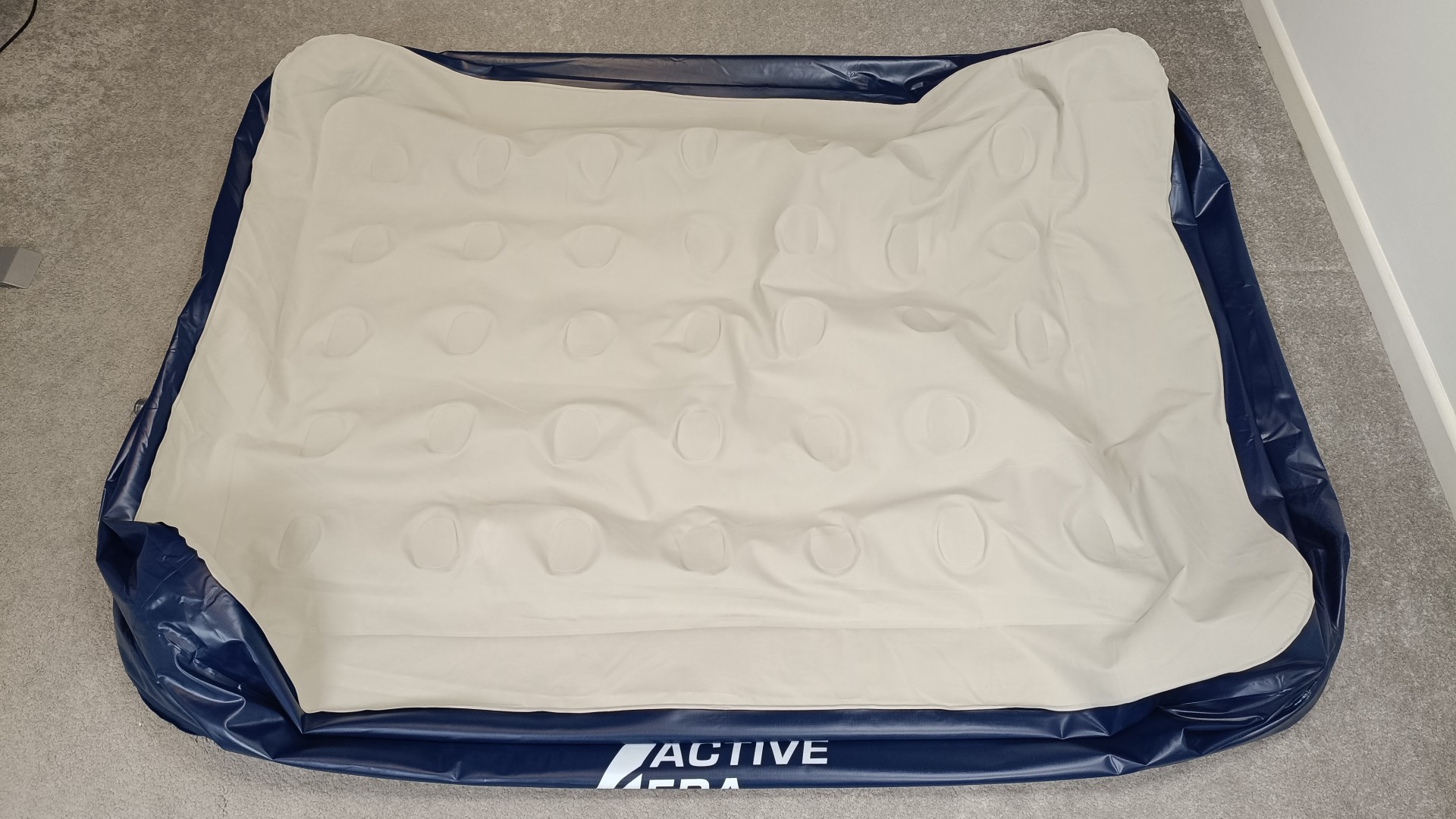 Active Era Air Mattress deflated on floor