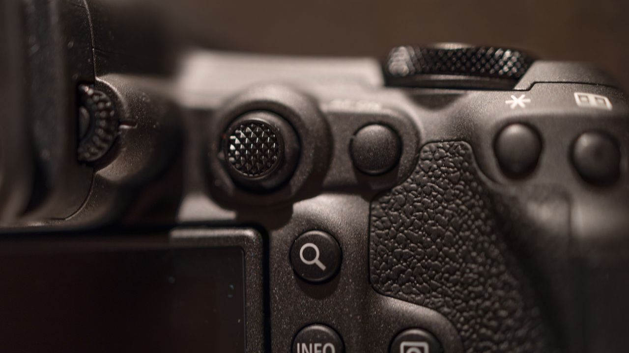 Canon EOS R5 Mark II against a dark background