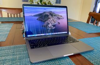 Dell XPS 13 vs MacBook Pro - MacBook Pro at table