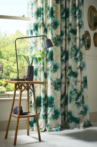 colourful paint effect curtains in fresh teal and white.