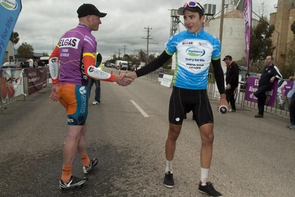 From one tour leader to another: Tour leader Joel Pearson (left) of Genesys Wealth Advisers shakes hands with former race leader James Williamson (Hyster-Total Rush) in Manangatang.