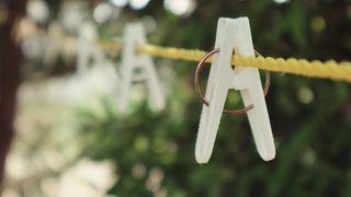 Clothes pegs on washing line