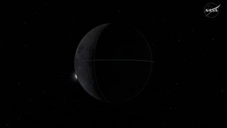 Screenshot from a NASA animation showing the final stages of the solar ecliipse that Artemis 2 astronauts will see from their vantage point beyond the moon on April 6, 2026. The sun is starting to emerge from the moon's left limb.