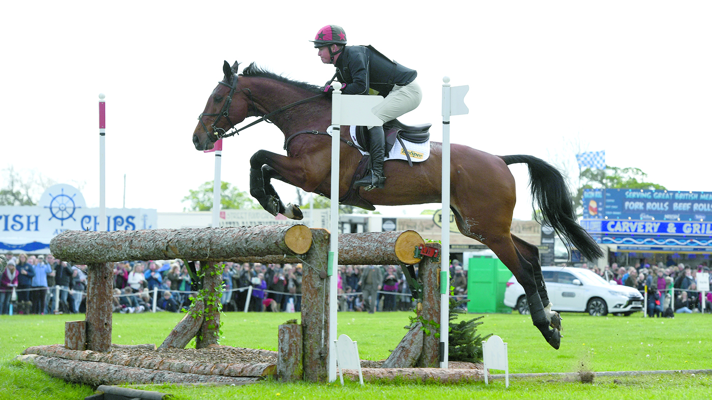 Matt Heath and The Lion jumping clear at Badminton 2019