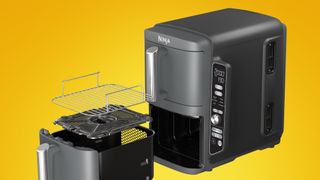 The Ninja Double Stack Air Fryer SL400 on an orange background