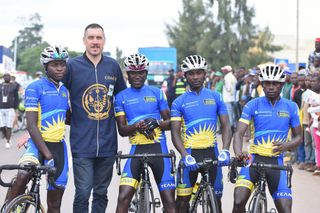 Sterling Magnell with his riders at the Tour of Rwanda